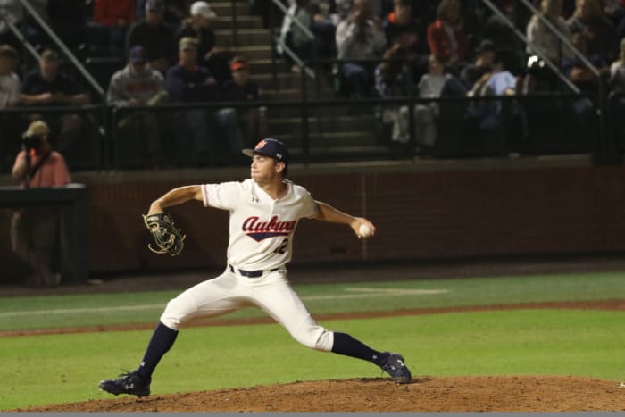 Drew Nelson pitching for Auburn baseball.